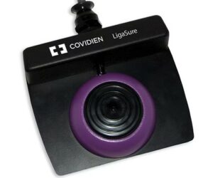 The orange, nine-pin LigaSure™ single pedal footswitch connector plug attaches to the purple LigaSure™ 2 footswitch receptacle on the rear panel of the ForceTriad™ energy platform. Once attached, the LigaSure™ orange single pedal footswitch activates LigaSure™ instruments that are connected to the LigaSure™ 2 instrument receptacle on the front panel of the system.